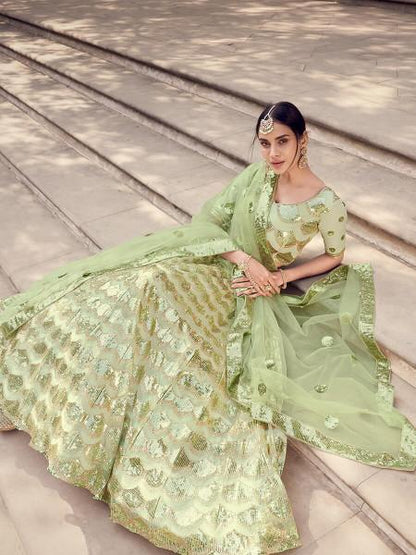 Women's  Pista Green Soft Net Heavy Embroidered Lehenga