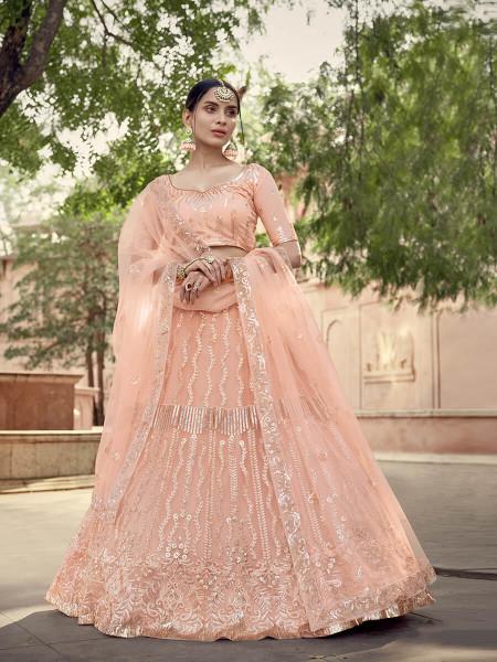 Women's  Peach Soft Net Heavy Embroidered Lehenga