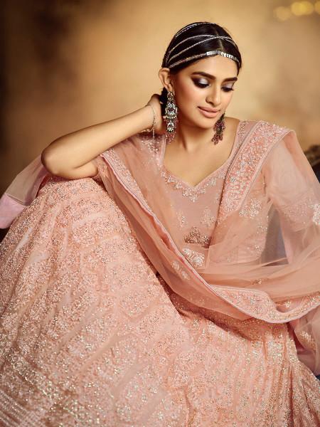 Women's  Peach Soft Net Heavy Embroidered Lehenga