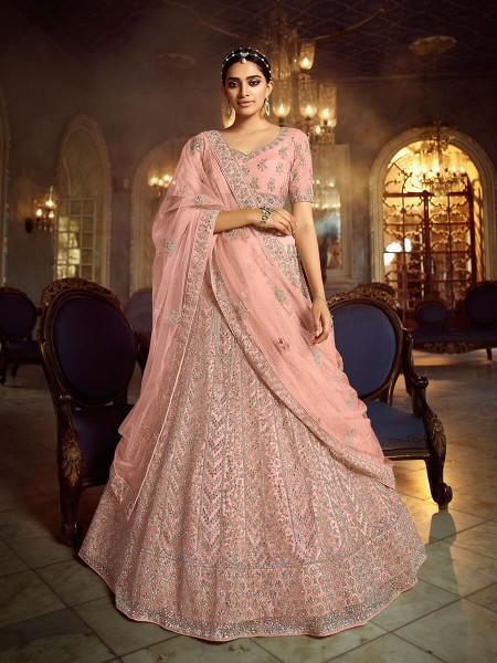 Women's  Peach Soft Net Heavy Embroidered Lehenga