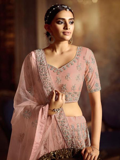 Women's  Peach Soft Net Heavy Embroidered Lehenga