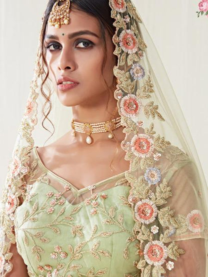 Women's  Pista Green Heavy Embroidered Net Lehenga