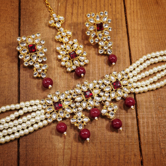 Women's Gold Plated White & Maroon Pearl & Kundan Studded Choker Necklace Set with Earrings & Maang Tikka