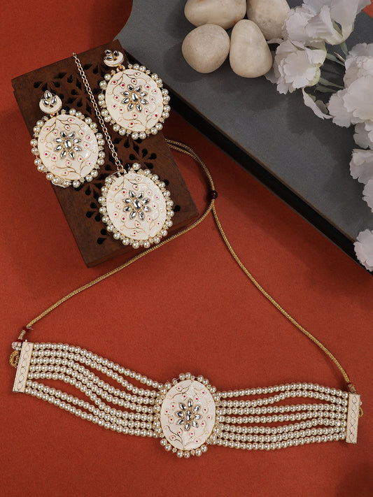 Women's/Girls Traditonal Gold Plated Enameled White Colored Oval Shaped Pearl Layeed Choker Set With Earrings And Maangtikka Set