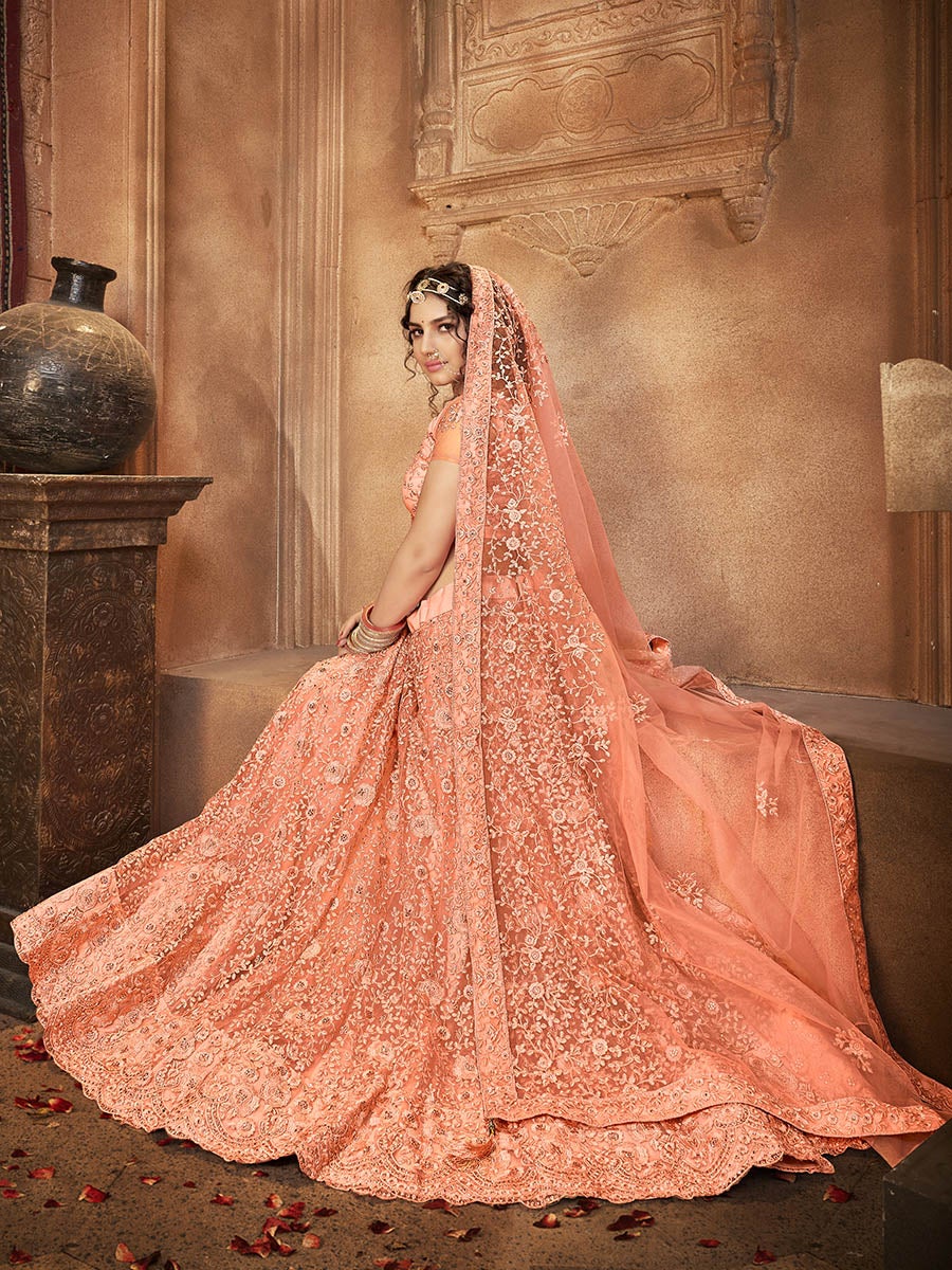 Women's Peach Heavy Embroidered Net Lehenga